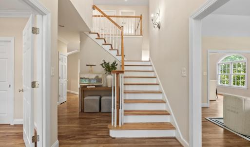 Welcome to 1547 Gilfield Drive.  This stunning custom home has the most beautiful grand entrance.  To the right, is a formal living room and to the left is an office space or potential main level bedroom (there is an adjoining full bathroom here as well).