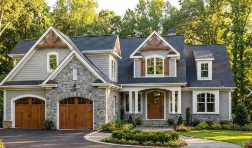 Photo is a rendering of house plan. Finishes will vary and are to be made at builder's discretion. Please reach out for confirmation of exact finishes throughout home. Plans for brick, stone, and wood board and batten on exterior.