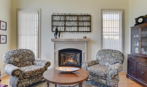 Gorgeous Keeping Room open to the kitchen, breakfast area with vaulted ceiling, gas log limestone fireplace