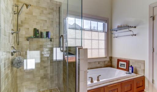 Relax in soaking tub! Beautiful tile shower!