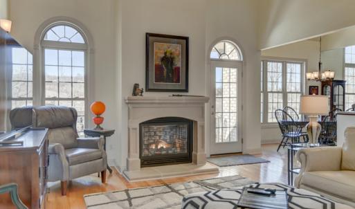 Great room, Gorgeous limestone gas log fireplace!!