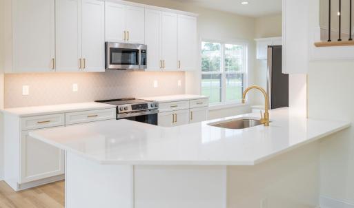 These photos are from this same floor plan on a previous build. Finishes will be similar but not identical.