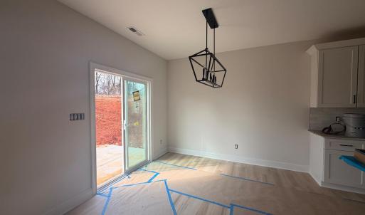 open concept with dining, living, and kitchen