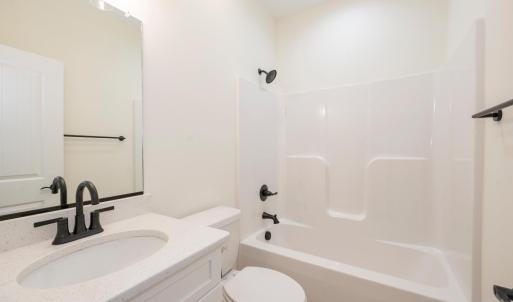 These photos are from this same floor plan on a previous build. Finishes will be similar but not identical.