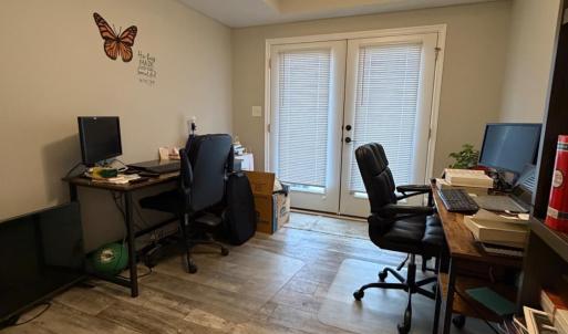 Bedroom 3 (downstairs) with walkout to rear patio