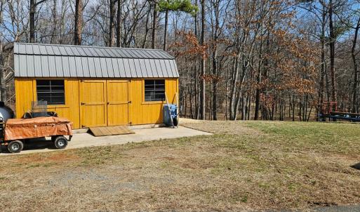 Beautiful new tool shed. Would make a great "She Shed"! The "He Shed" is the huge, detached garage!