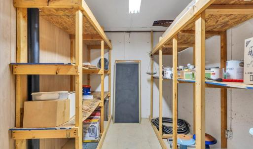 Storage room with all concrete walls - could be finished into a safe room-