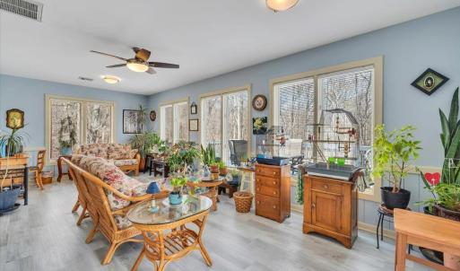Sunroom with new LVP & windows