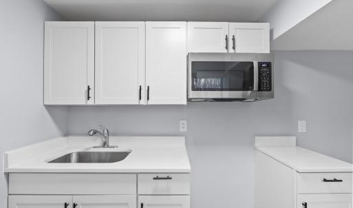 Full Kitchen in basement. All you need to bring is the Fridge and Electric Oven