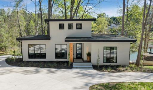 THIS PROPERTY IS ON COUNTY SEWER AT THE LAKE!  This contemporary new construction lake front home is located at one of the most convenient locations on the lake! Only minutes to Bridgewater offering marina, shopping, dining, live music, coffee shop, ice cream, mini golf, and more!