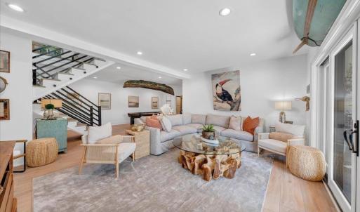 Terrace level, covered entertaining space is perfect for a quiet retreat for your guest and family!