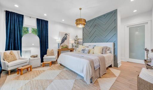 The primary ensuite offers a private oasis including a second laundry space!