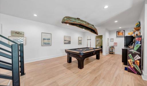 Wet bar and game room come fully equipped for immediate occupancy!