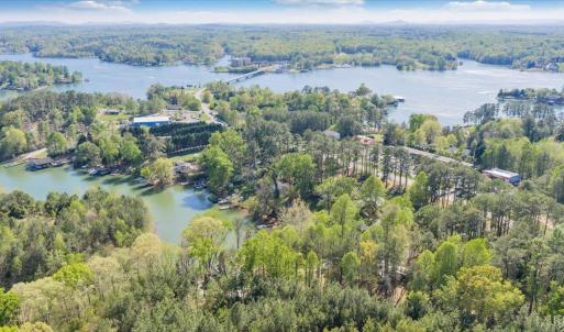 Tucked away in a private uncluttered cove perfect for floating and family fun! The brand new contemporary dock will be completed by spring! Renderings are available to serious buyers!