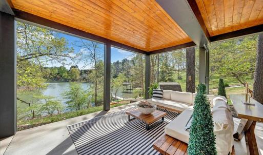 This one of a kind property offers almost 2,000 square feet of covered and open-air outdoor living space overlooking scenic beauty of Smith Mountain Lake!