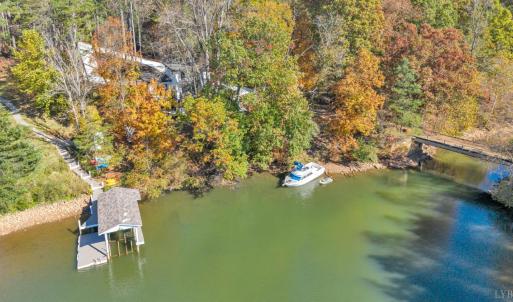 Tucked away in a private uncluttered cove perfect for floating and family fun! The brand new contemporary dock will be completed by spring! Renderings are available to serious buyers!