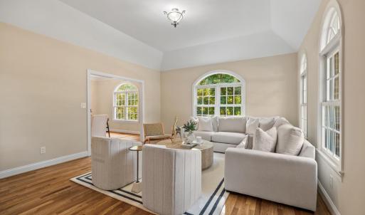 Formal living room with lots of natural light