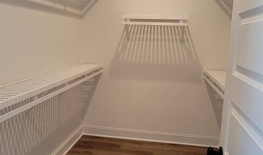 Primary closet (Similar to photo)