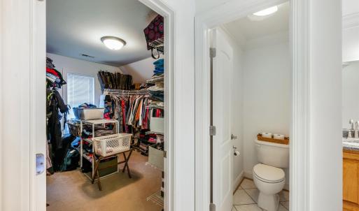 Primary bedroom with large walk in closet and private toilet room