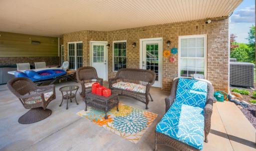 Terrace level patio,  with sun shades, off of the food garden