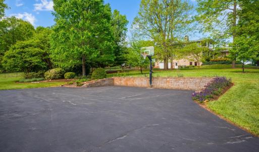 Super large parking area with basketball court