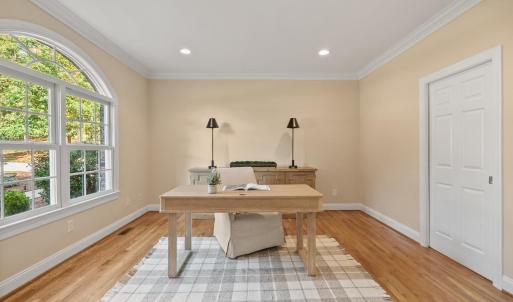 Office with adjoining full bathroom with walk-in shower.  This room could be used as a main level bedroom as well.