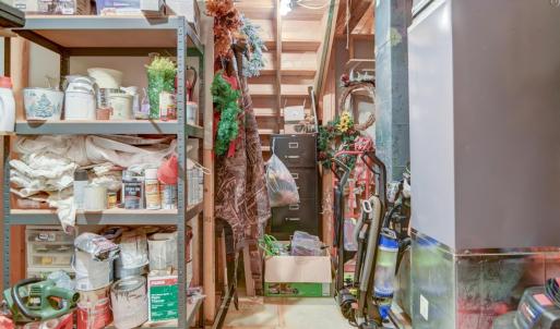 Unfinished storage space- lots of room for storage in this house.