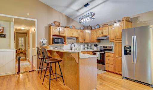 Great Kitchen, new granite countertops, stainless-steel appliances, and eat-in bar.