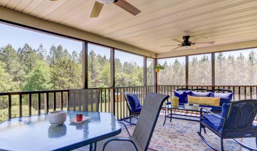 This is a fantastic screened in porch - for morning coffee, watching guests at the pool from above, or just enjoying the afternoons.