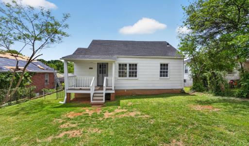 Covered back porch. Beautiful open, flat backyard. fully fenced and ready to garden or add a play yard! Wonderful for hosting.