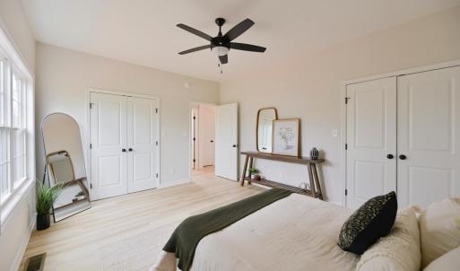 main level primary bedroom with dual closets