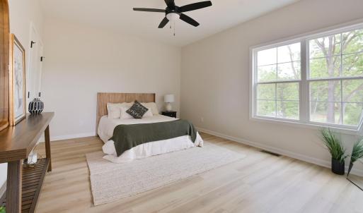 main level primary bedroom with dual closets