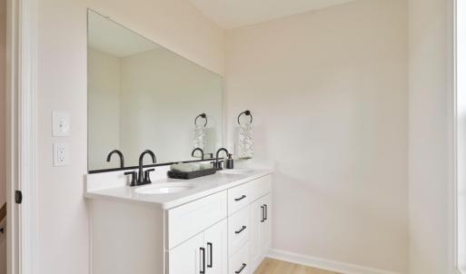 2nd full bathroom, with double vanity, located upstairs