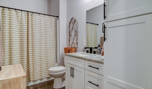 Bedroom 2 & 3 - shared bathroom - granite counter tops. tub & shower