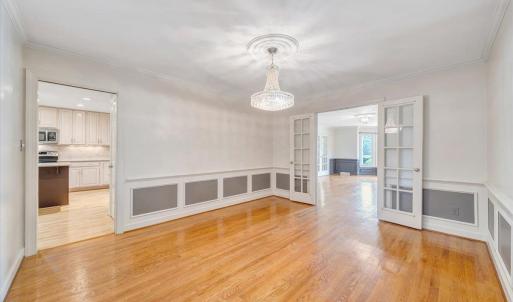 Formal dining room accented by chair rail and wainscoting