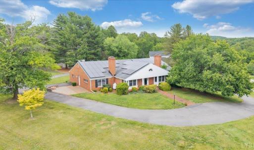 Situated on a beautiful corner lot in Ivy Hill