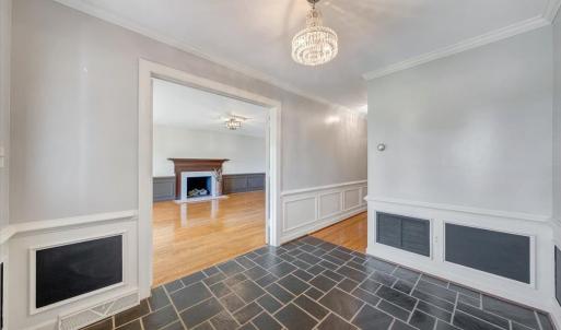 The foyer is the perfect place to greet guests.  To the left is the formal living room and to the right is the large main level family room