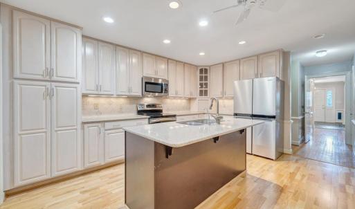 Beautiful kitchen with stainless appliance, including a new dishwasher.