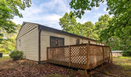 Back side of the house with shed in far right background