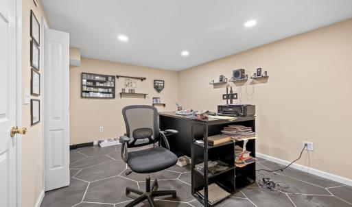 Downstairs office or bedroom. No window in this room. There is a window at the bottom of the stairs just outside the room with legal egress window