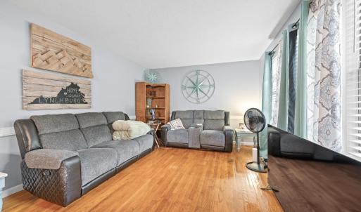 The living room is just off the front door entrance