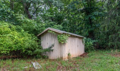 Storage shed outside the entrance wall to the downstairs