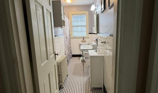 Bathroom with Original, Beautiful, Tile.