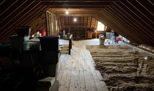 R30 Cellulose Insulation Blown In Under Flooring and Open Area in 2014.