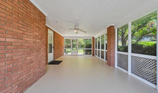 The screened-in porch extends the home's living area and provides an excellent opportunity for future expansion.