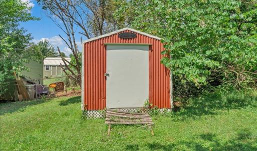 Storage shed conveys as-is!