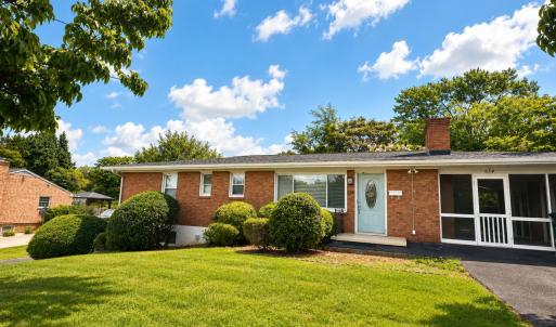 Newly updated home with two separate paved driveways servicing the main level and finished terrace level! Perfect home for a family, multigenerational, or investment property!