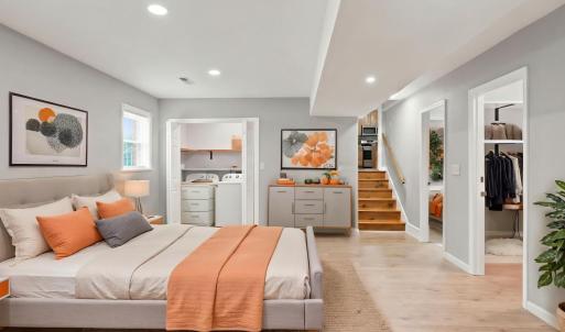 This virtual staging shows the basement as a primary bedrooms or inlaw suite.