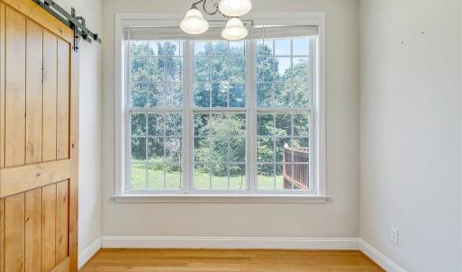 Cozy breakfast nook overlooking the spacious and private back yard!