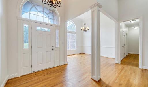 Elegant entrance with 3/4 inch hardwood flooring throughout the main living areas!